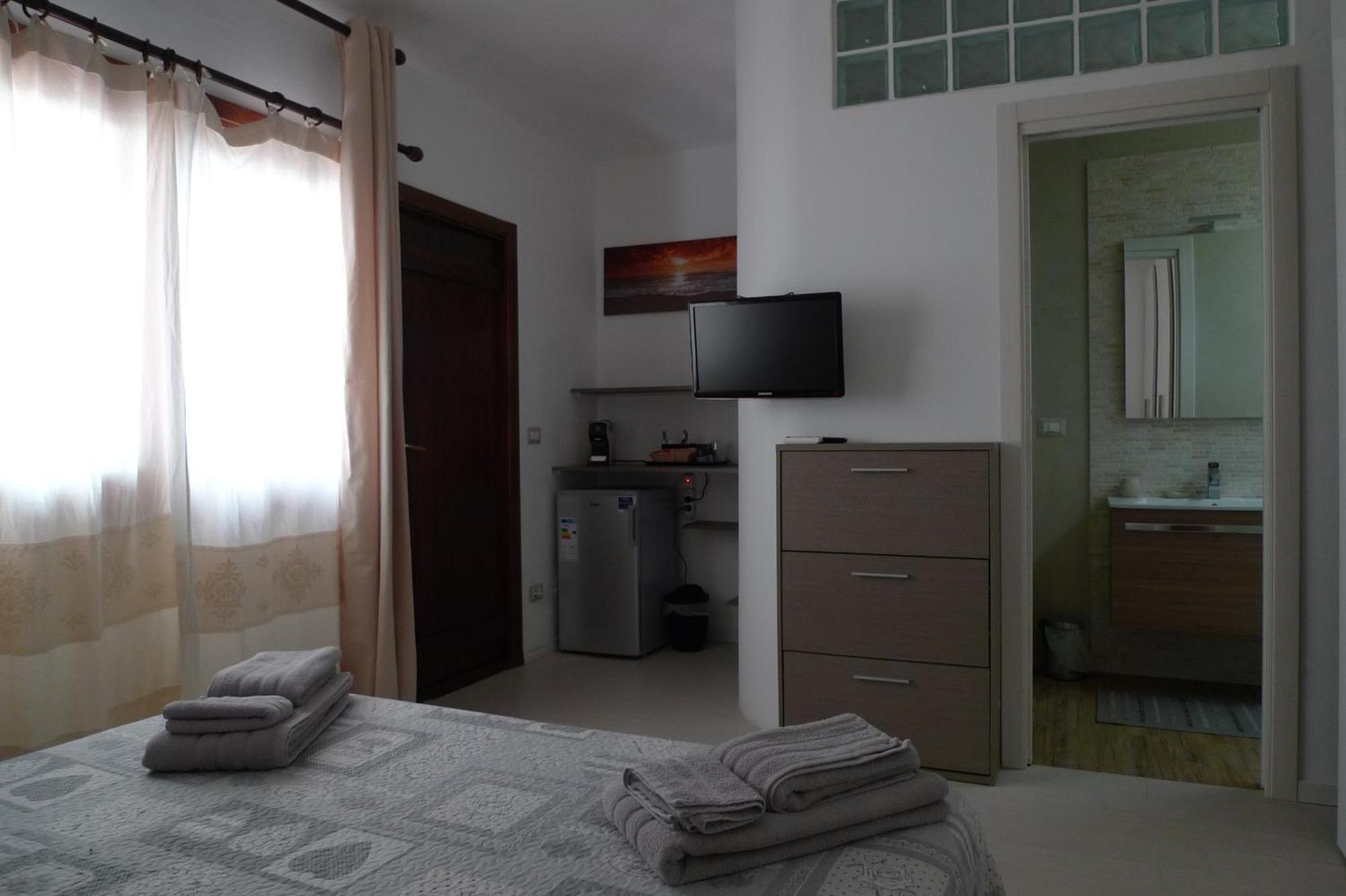Villaggio Est Affittacamere San Teodoro  Pokoj fotografie